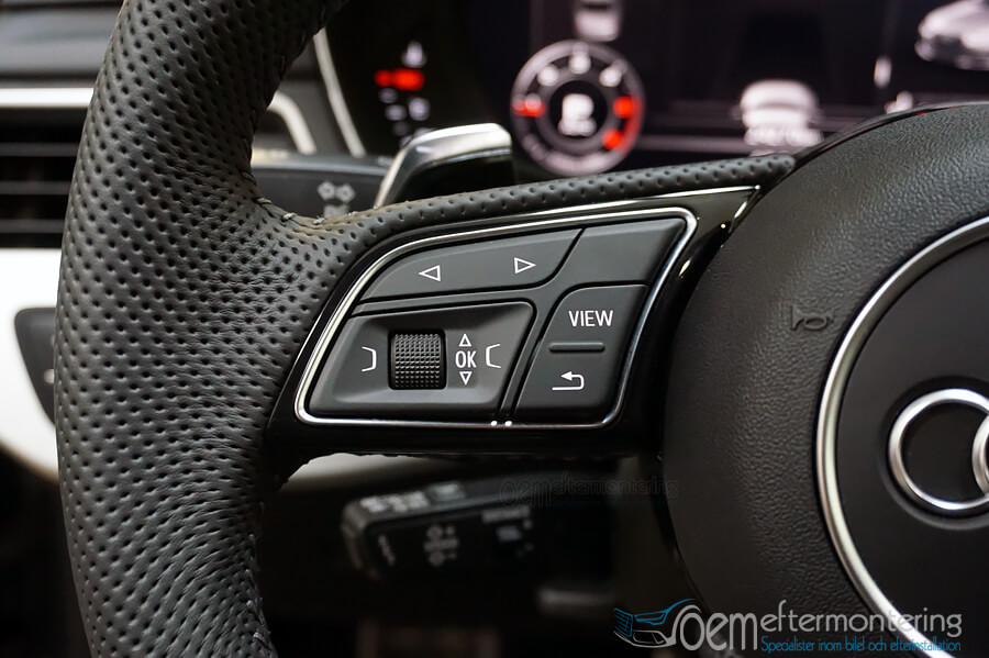 Knappar på ratten för byta låt Audi A5 (A4, Q5)
